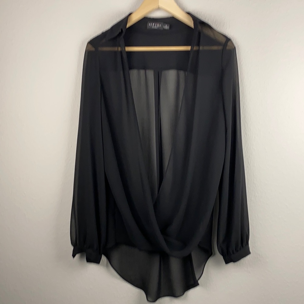 Iris Swetlwke black blouse size 4
